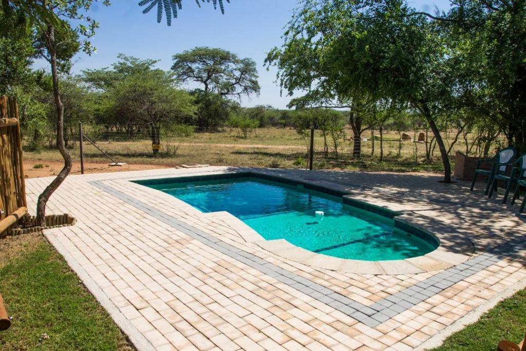 Chameleon Bush Lodge Hammanskraal Bagian luar foto